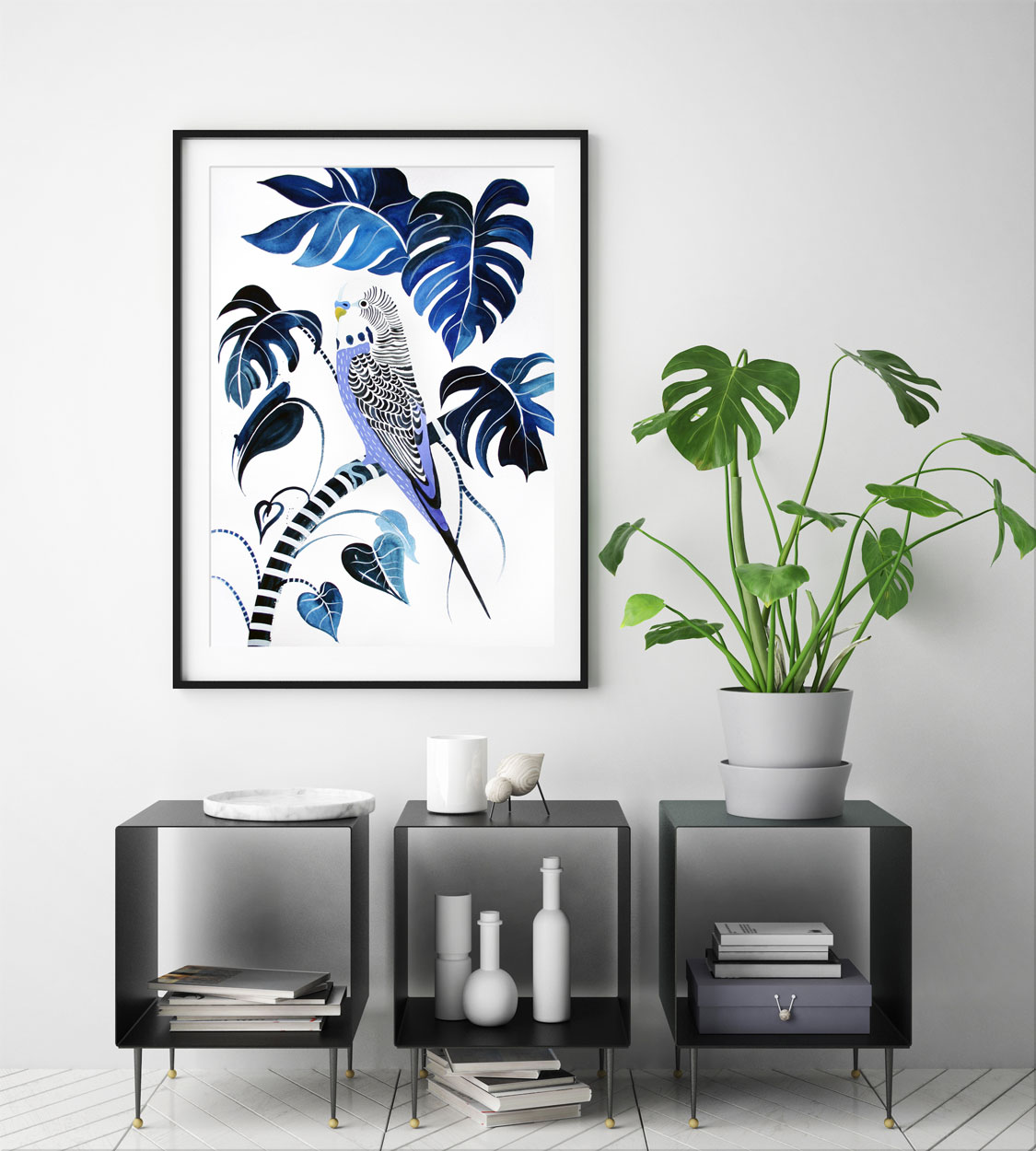 Painting of a budgie framed and hung above a modern cabinet