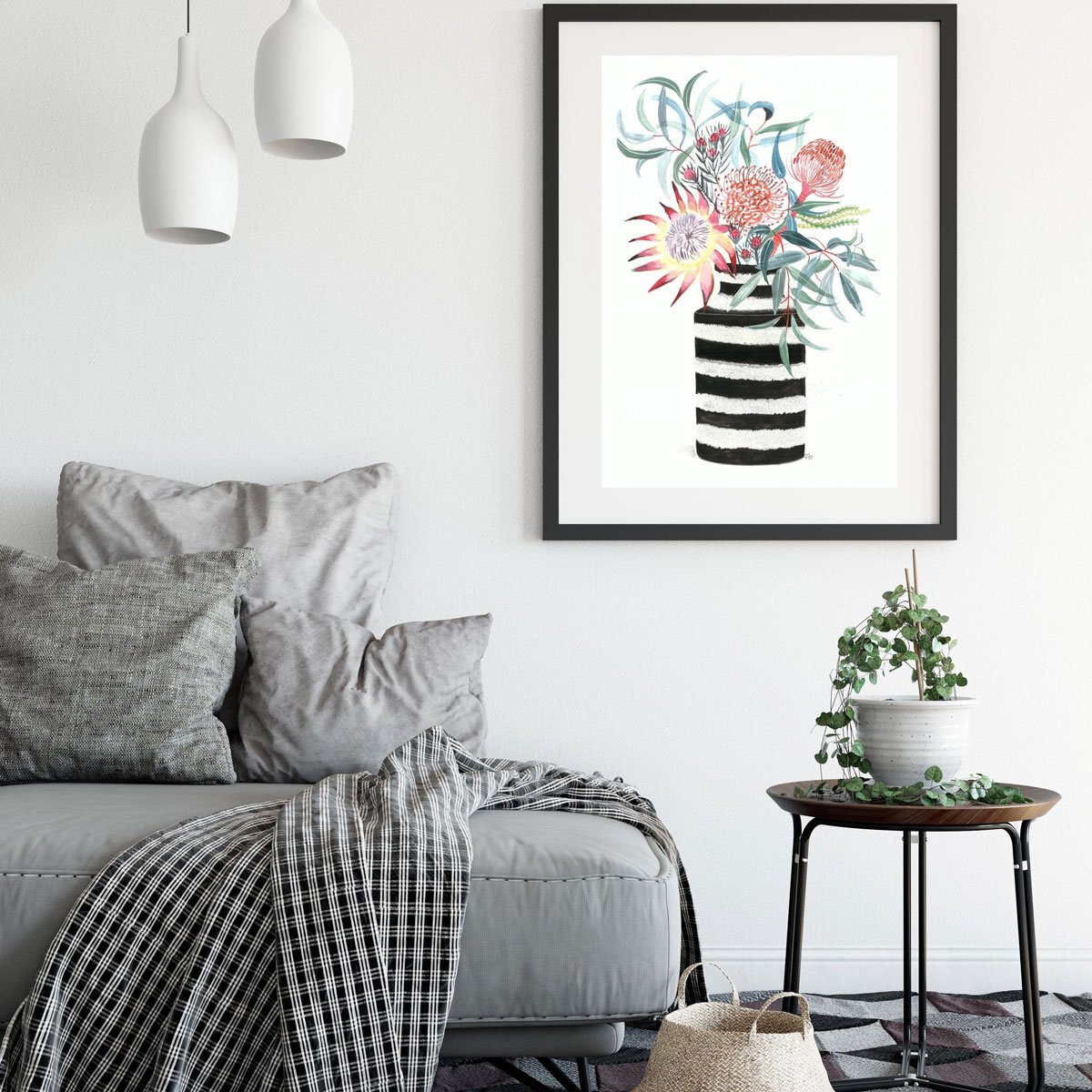 Painting of flowers in a vase hanging in modern grey living room