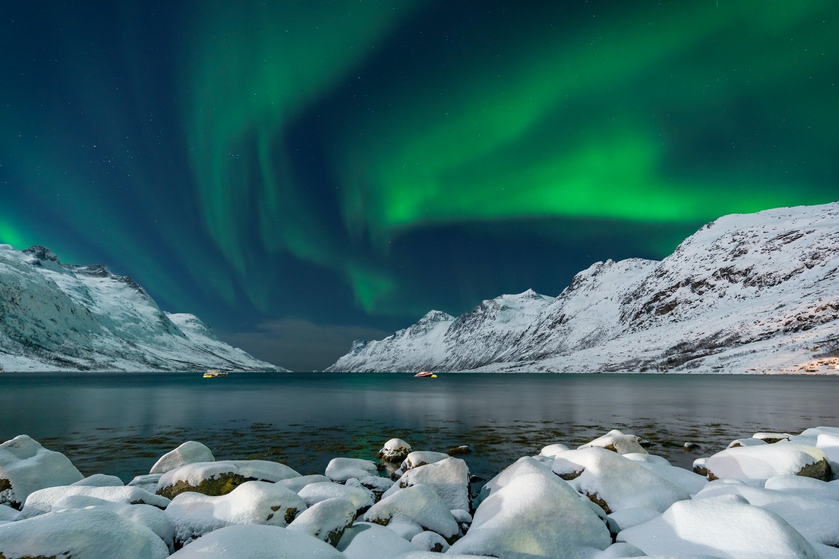 'Ersfjorden Northern Lights' (photograph) by Lachlan Garutti. Photographic print of a photograph of the northern lights above water in Norway. Art