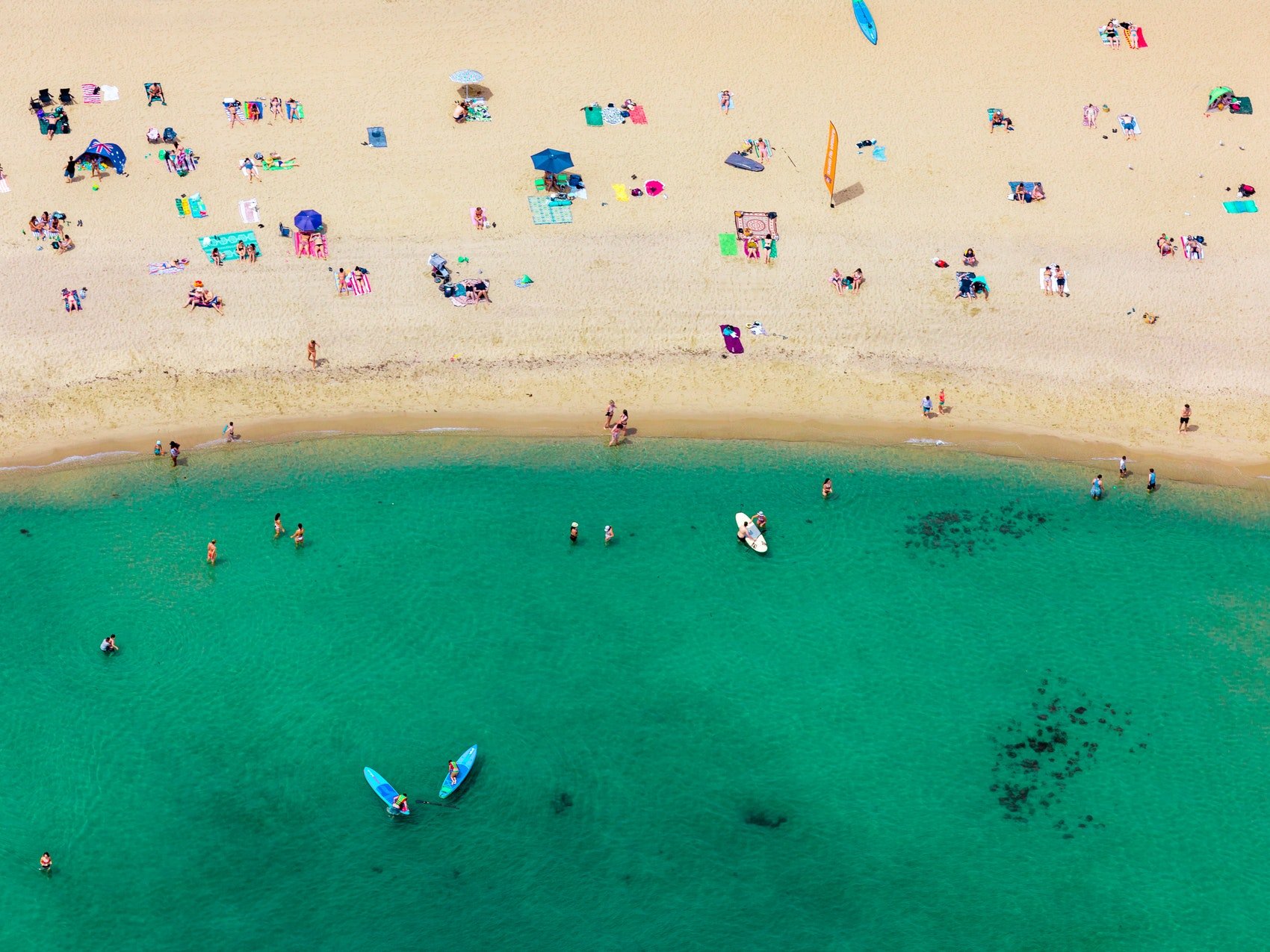 'Melbourne Summer' (print) by Penny Prangnell. An aerial fine art print of a beach with sunbathers and surfers.