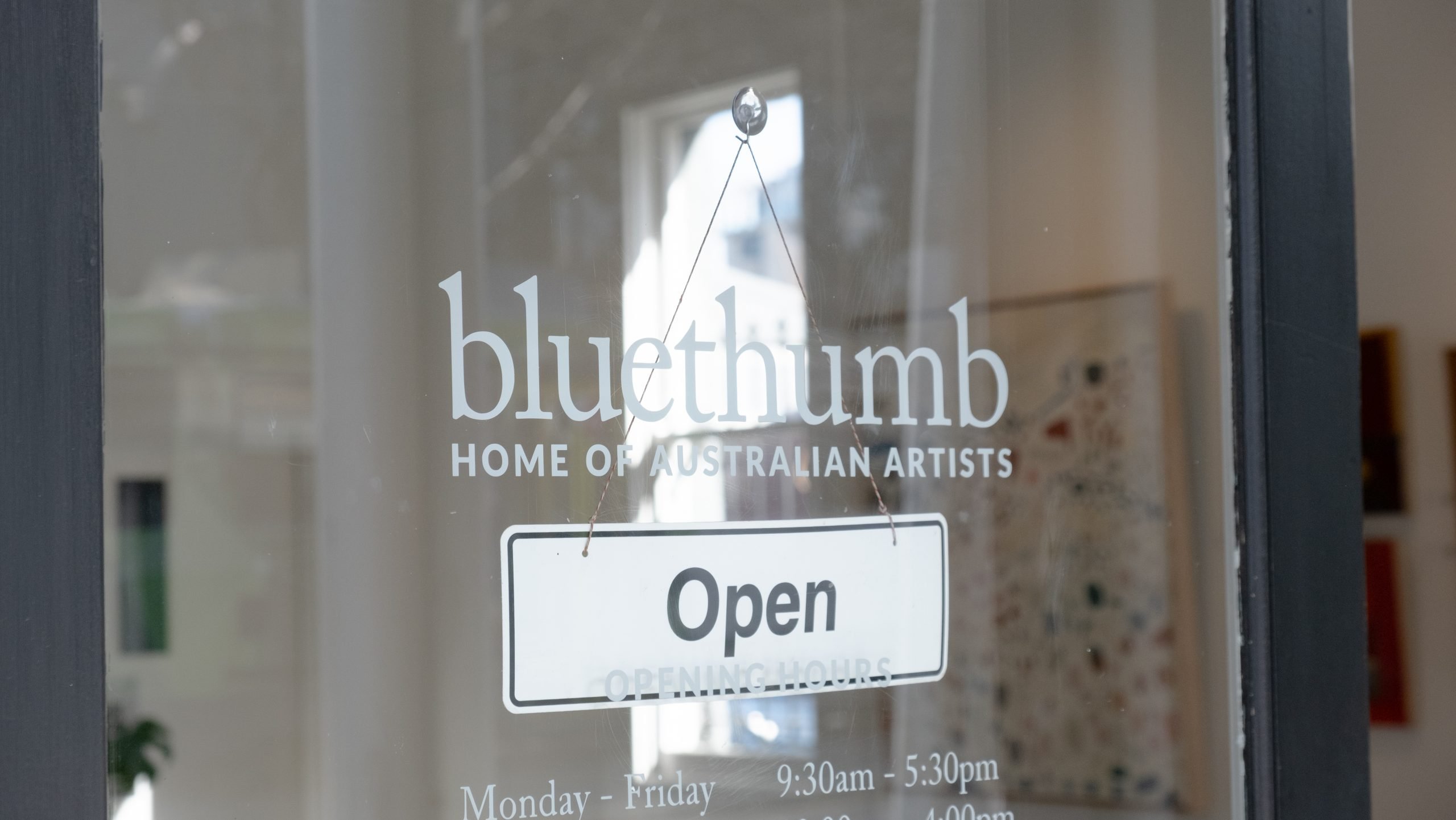 Bluethumb Melbourne Gallery Entrance, With Michael Wolfe's Artwork In The Window.