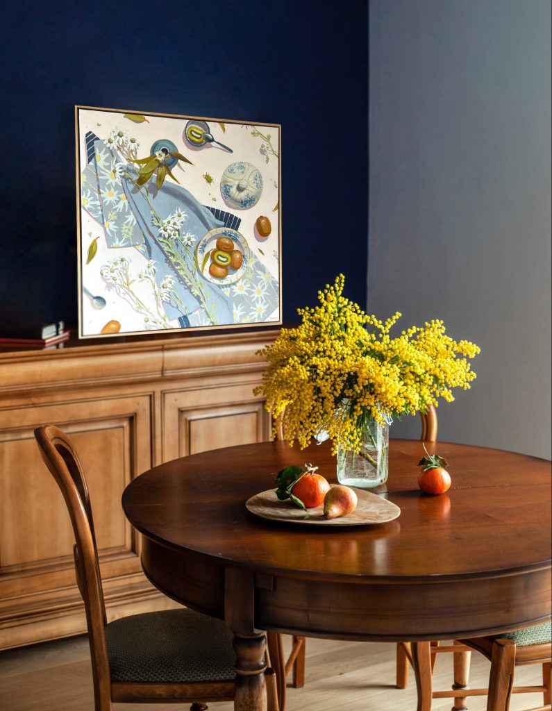 Flannel Flowers and Kiwi Fruit by Kirsty McIntyre is the perfect addition to the buffet table in this dining room.