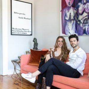 Alyssa with her partner in their first home in New Orleans, surrounded by some of the initial pieces in her personal collection. Photo by Jacqueline Marque.